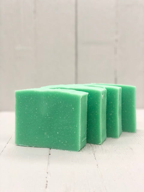 A mint green soap bar.