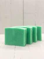 A mint green soap bar.
